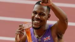 hughes-wins-world-100m-bronze-as-lyles-triumphs