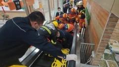 woman-hospitalised-after-falling-through-travelator-in-china