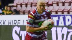 super-league:-wigan-warriors-36-14-castleford-tigers-–-warriors-keep-pace-at-top