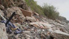 coastal-landfills-spill-waste-on-beaches-and-sea,-say-scientists