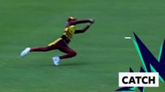 t20-world-cup:-west-indies'-roston-chase-takes-brilliant-catch-to-dismiss-papua-new-guinea-captain-assad-vala